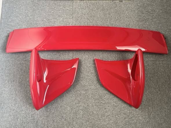 Genuine-style rear wing designed for the Mazda RX-7. Direct fit for the FD3S chassis, ideal for replacing a worn spoiler or upgrading for a clean OEM+ appearance. Product Details: Genuine-style rear wing / rear spoiler Direct bolt-on fit for FD3S RX-7 Enhances rear styling while maintaining OEM aesthetics Durable construction for street or show use Perfect for restoration or aesthetic upgrades