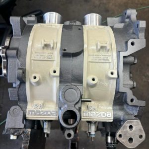 Mazda 12A P-Port engine for sale, peripheral ported 12A rotary, fuel injected 12A motor, high-RPM RX-7 SA/FB rotary engine, Mazda 12A performance build, track-ready 12A rotary, custom RX-7 rotary swap, high-performance 12A P-Port motor, Mazda 12A fuel injection upgrade.