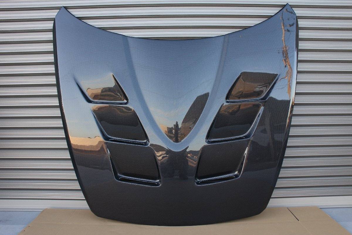 Mazda RX8 carbon hood, RX8 carbon fiber hood, RX8 vented hood, RX8 performance hood, Mazda RX8 carbon fiber parts, RX8 lightweight hood, RX8 aftermarket hood, RX8 carbon fiber body parts, RX8 vented carbon hood, rotary RX8 parts. 🚗🔥